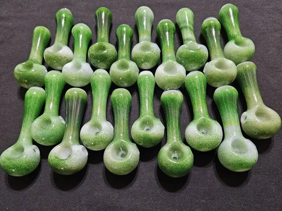 A full collection of green glasswork